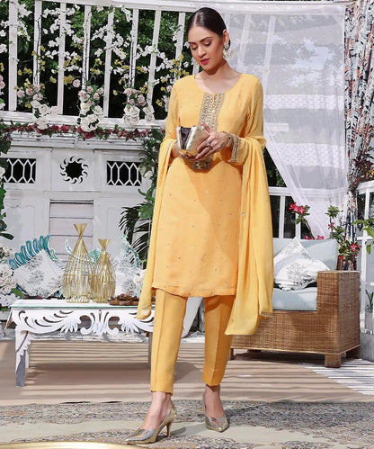 Mustard-yellow embroidered tunic set with straight pants and draped dupatta