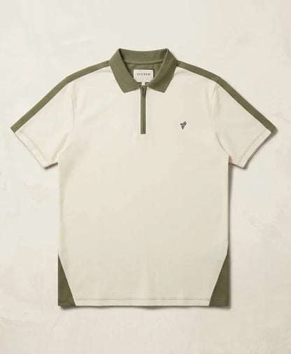 Fitted polo shirt with olive collar and sleeve stripes, white body, half-zip