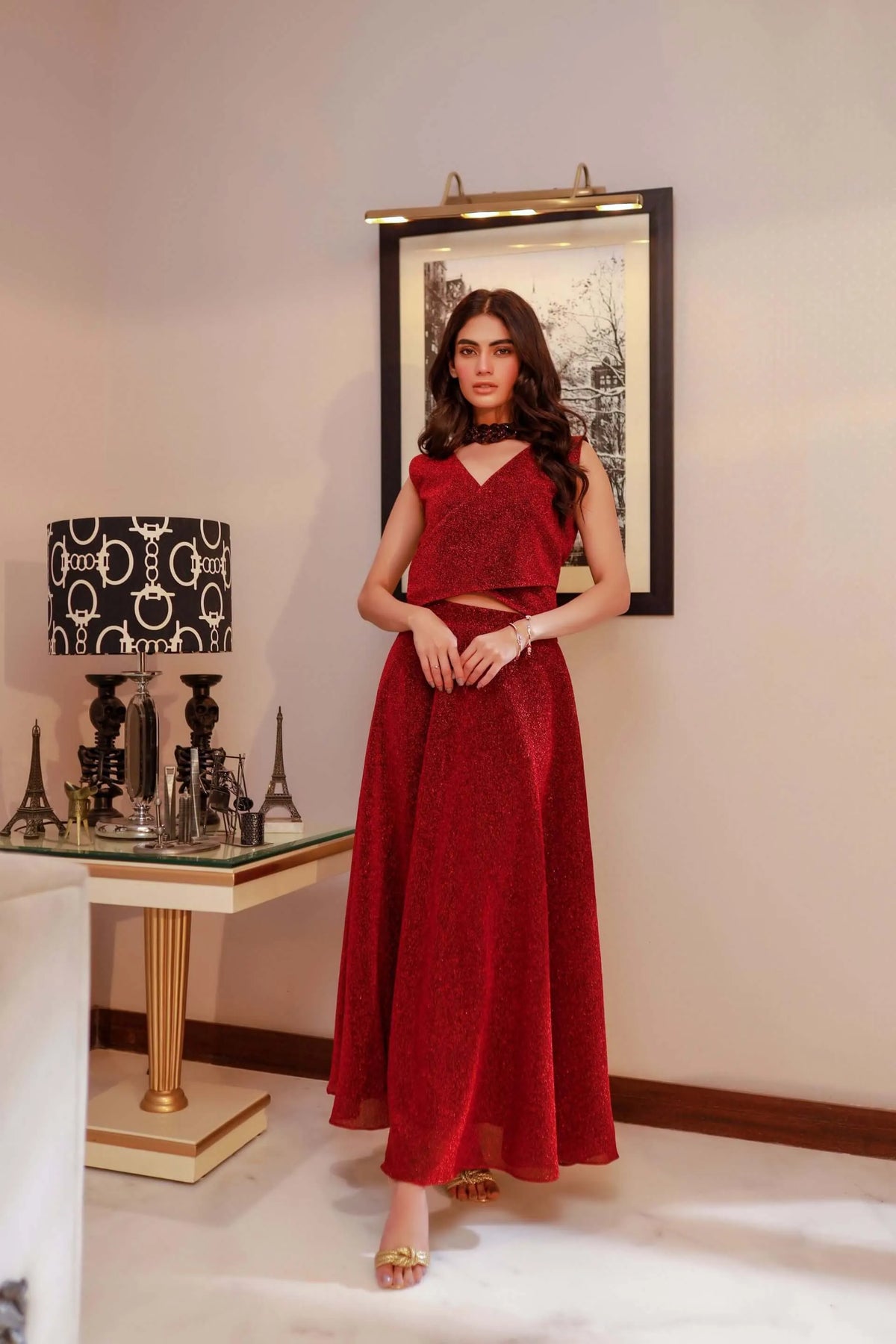 Red sleeveless V-neck velour maxi dress, fitted bodice and flowing skirt