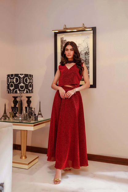 Red sleeveless V-neck velour maxi dress, fitted bodice and flowing skirt