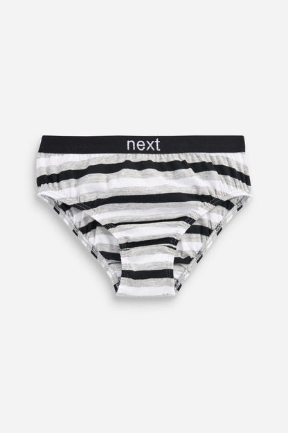 Black and white striped briefs with 'next' waistband