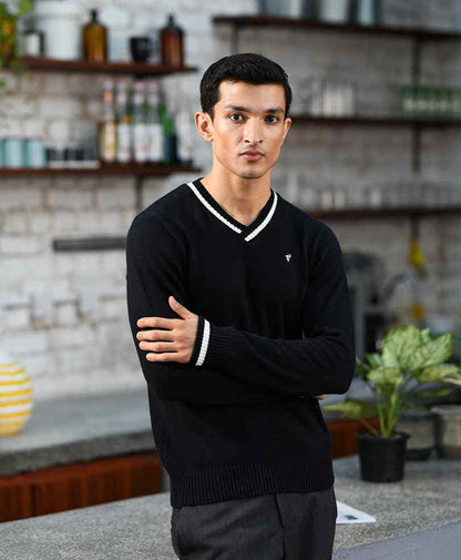 Black fitted V-neck knit sweater with long sleeves and ribbed cuffs, small chest logo