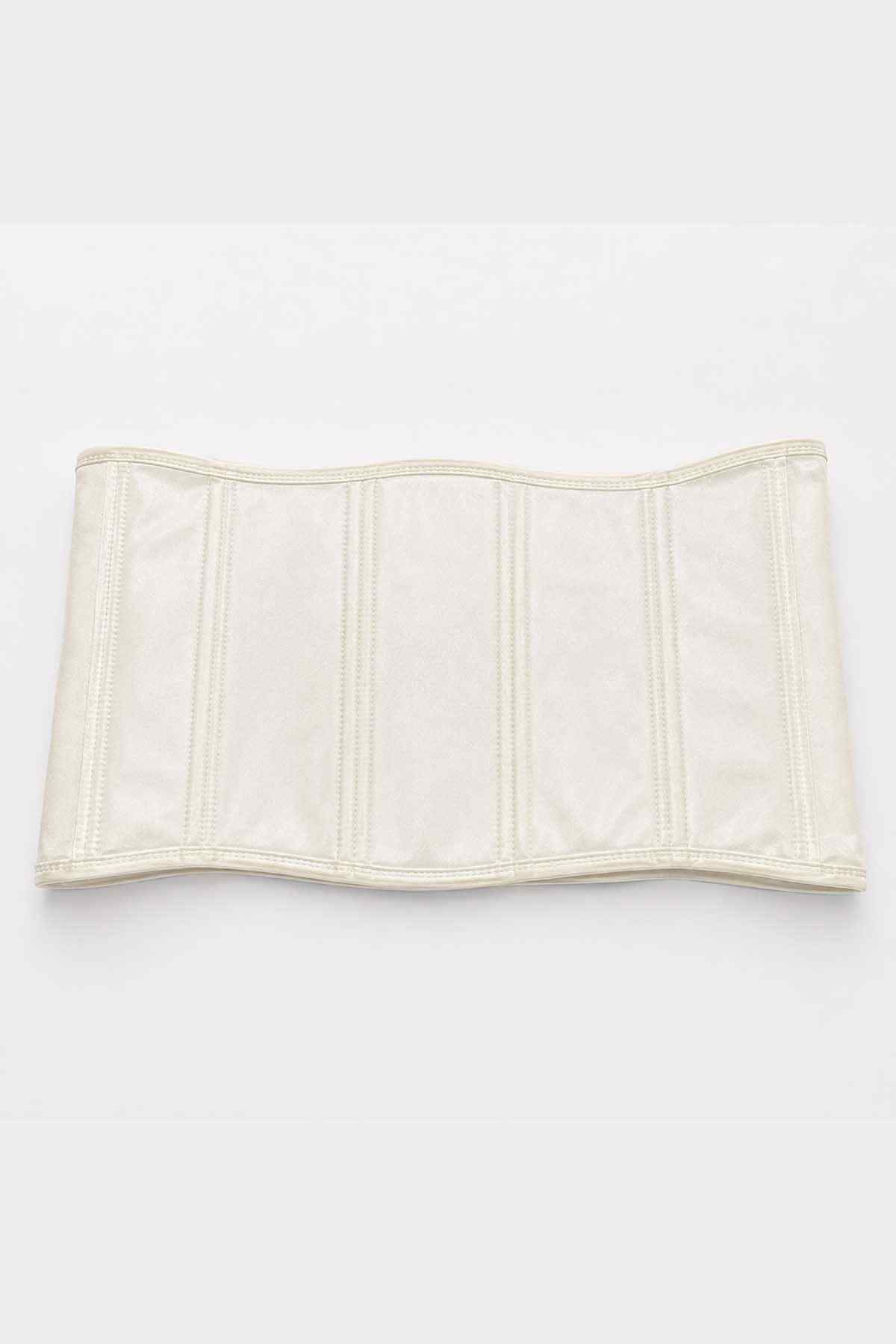 Cream belly band flat lay with vertical stitched strips