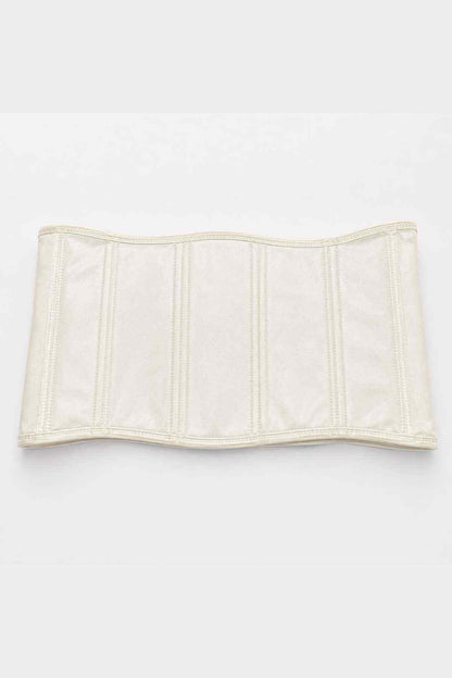 Cream belly band flat lay with vertical stitched strips