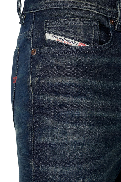 Diesel denim jeans detail: waistband patch label and stitched front pocket