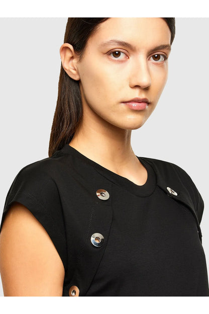 Black T-shirt close-up with round metal buttons at shoulder and chest