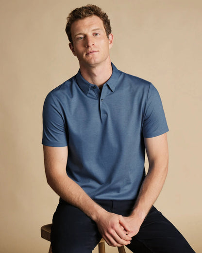 Blue polo shirt front view with short sleeves