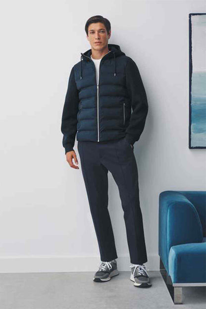 Navy hooded quilted puffer jacket with zip front and side pockets