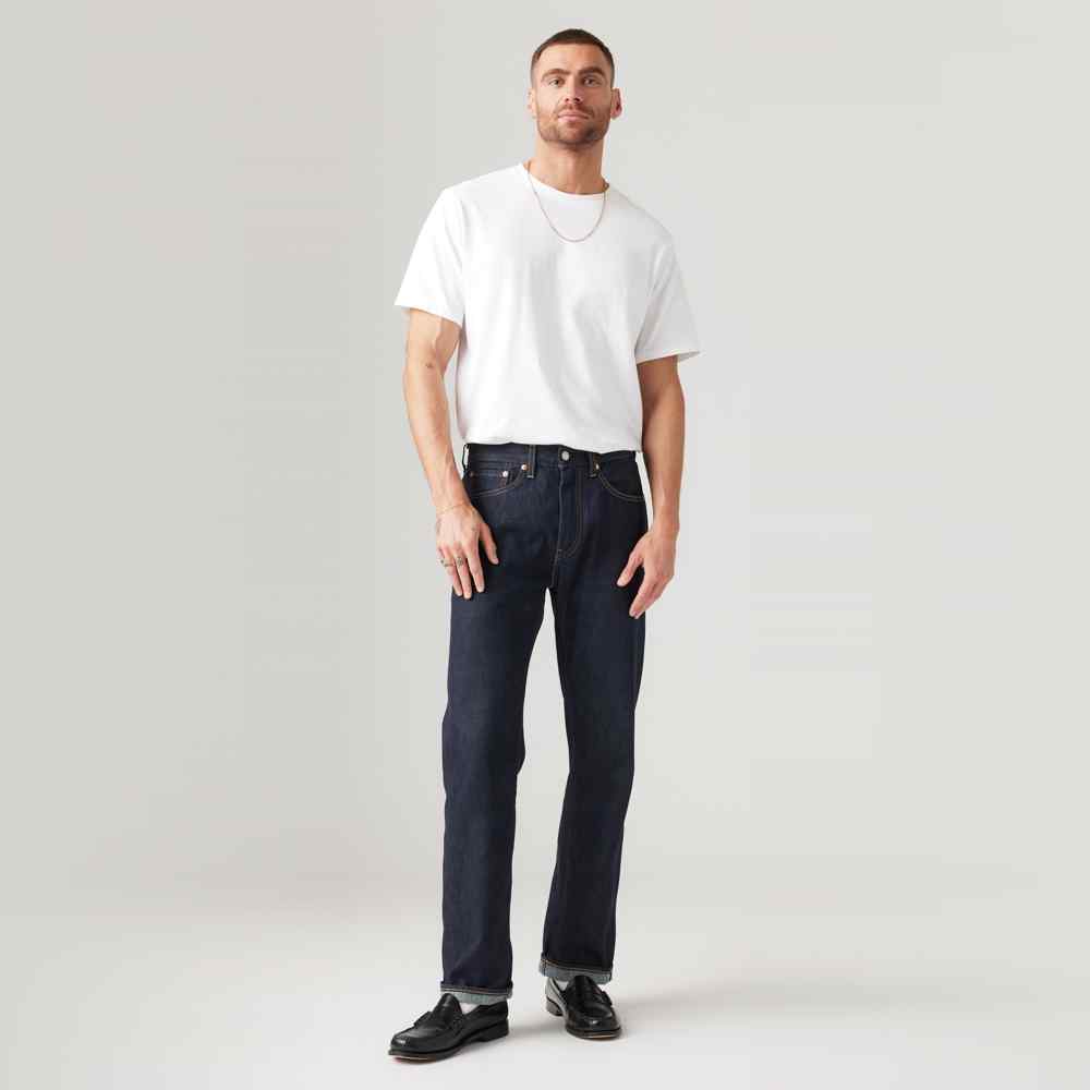 Dark wash denim jeans with straight leg, front patch pockets, and belt loops