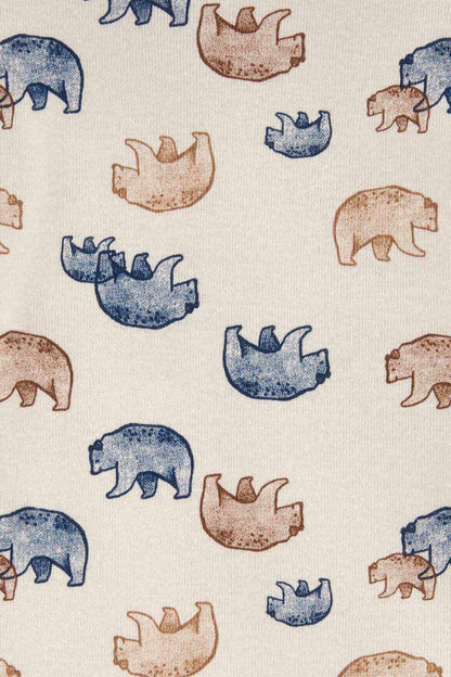 Cream bodysuit fabric with blue and orange dinosaur pattern