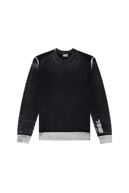 Black crewneck sweater with gray ribbed cuffs and hem; sleeve graphic