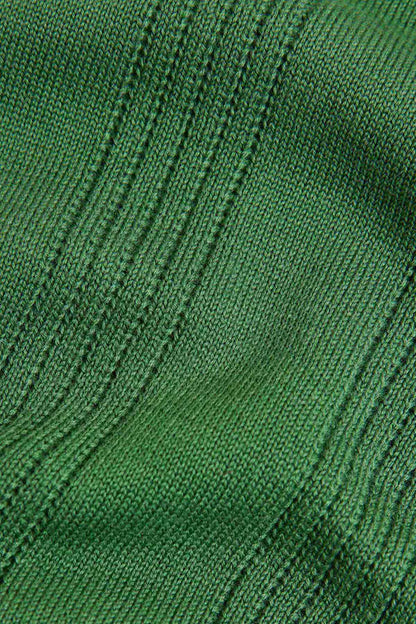 Green ribbed knit fabric with subtle vertical stripes