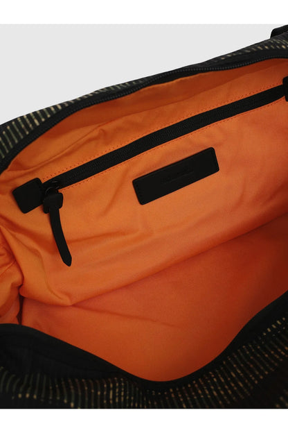 Diesel duffel bag interior panel with orange lining, strap tab, and zip pocket