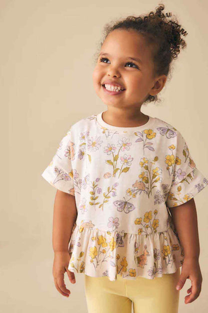 Girls' floral peplum top, ecru and white short sleeves with gathered waist