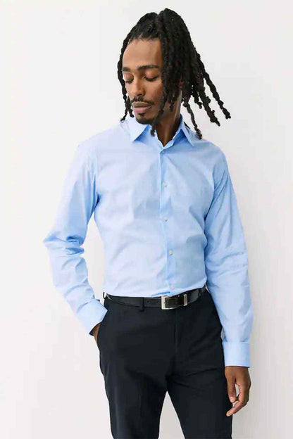 Light blue long-sleeve button-up shirt with pointed collar and button placket