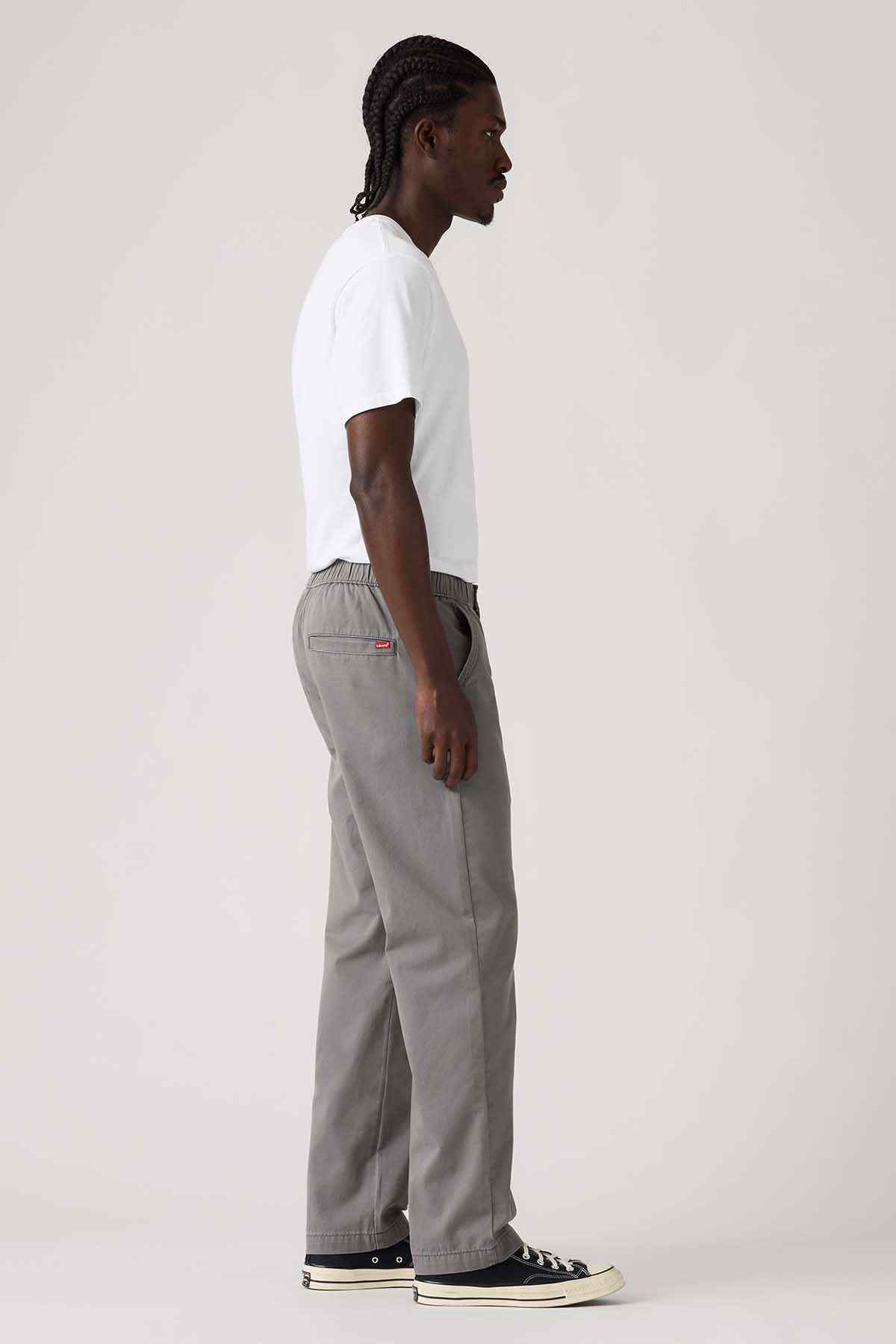 Levi's grey elastic-waist straight pants, side profile with hem stitching