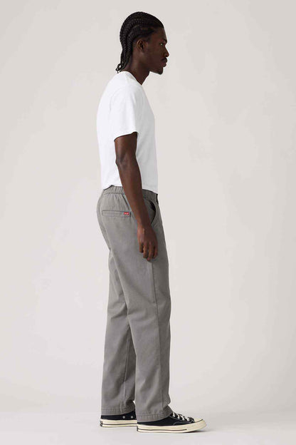 Levi's grey elastic-waist straight pants, side profile with hem stitching
