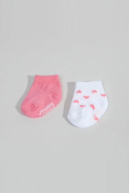 BABYSHOP baby ankle socks: one pink, one white with pink heart pattern and logo