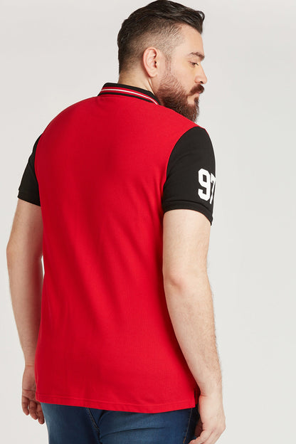Men's red polo shirt, striped collar and black back sleeves with '97' print.