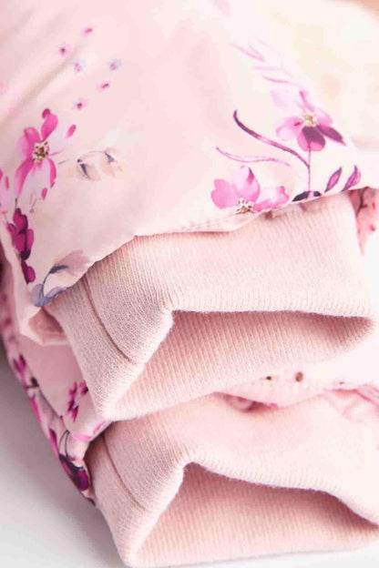 Pink floral puffer jacket sleeve cuff with soft ribbed knit lining