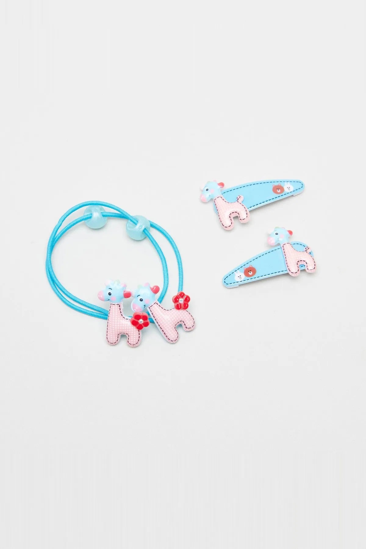Light blue baby hair ties with bunny and flower appliques