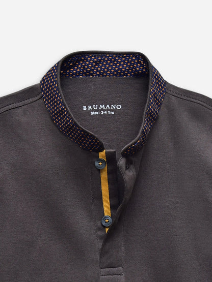Charcoal polo shirt collar with patterned inner trim and contrast button placket
