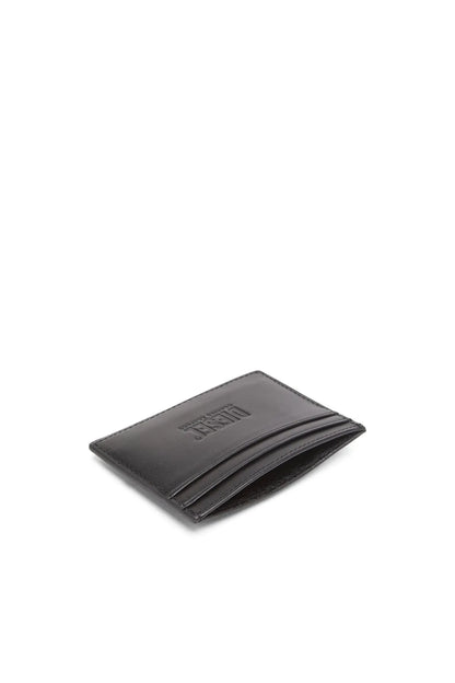 Black Diesel card holder wallet, folded view showing card slots and embossed logo