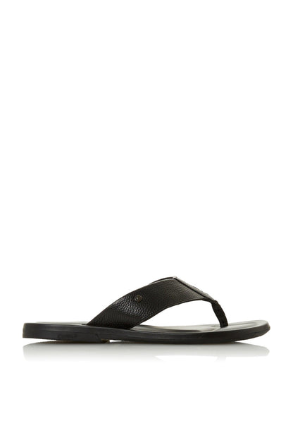 Black textured slide sandal with wide crossover strap and flat rubber sole