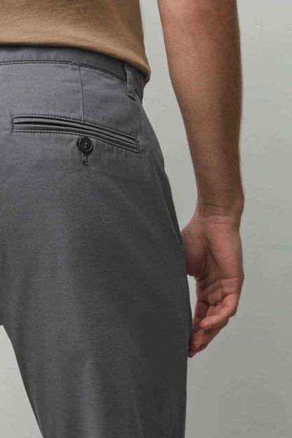 Dark grey chino waistband with button closure and belt loops
