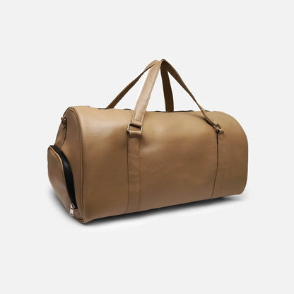 Tan leather-look duffel bag with dual top handles and front zip pocket