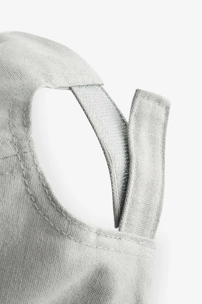 Grey baseball cap front with V-shaped emblem stitch