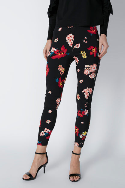 Black floral print tapered ankle pants