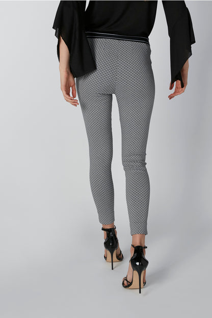 Splash pants: gray micro-pattern slim ankle pants with black blouse at waist