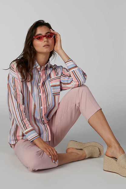 Pink cropped wide-leg trousers with bow-tie waistband and pleated front