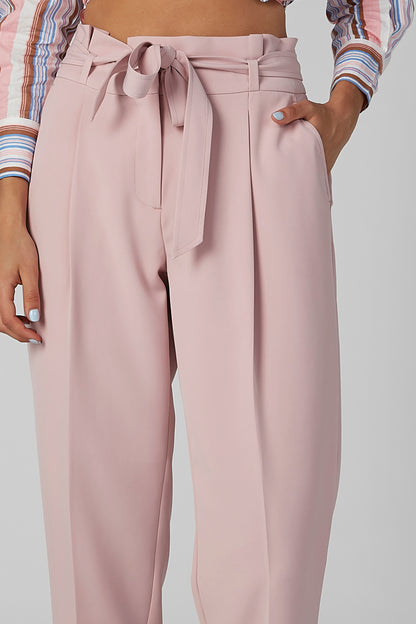 Pink wide-leg trousers with bow-tie waist, belt loops, and front pleats