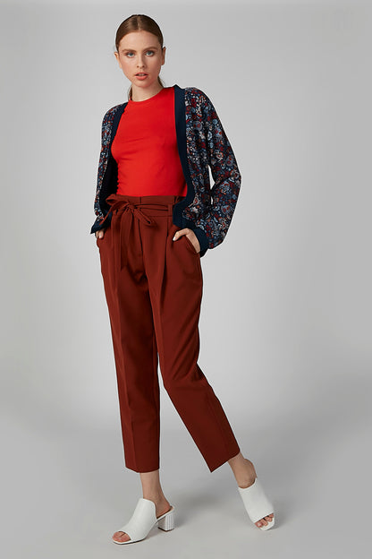 Brown cropped pants with drawstring waist tie, tapered at ankle