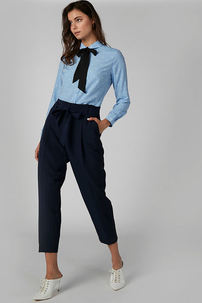 Navy high-rise cropped trousers with belt-tie waist and straight legs