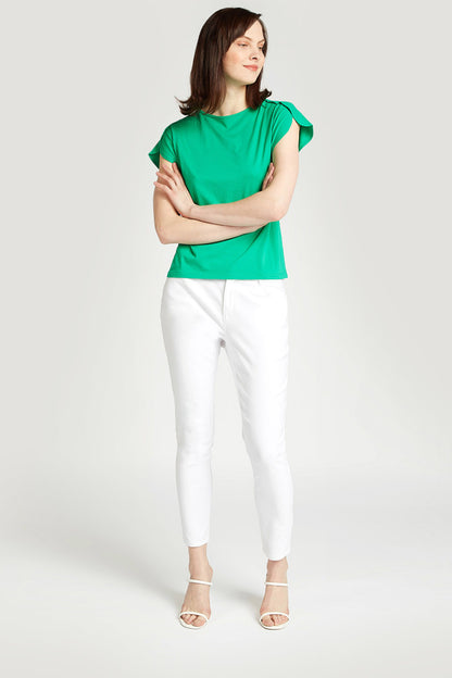 White ankle-length tapered pants with belt loops and slim fit