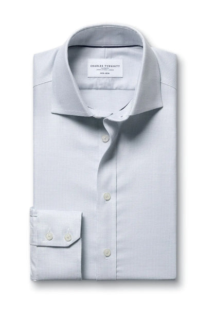 Charles Tyrwhitt dress shirt folded with button front, spread collar, long sleeves
