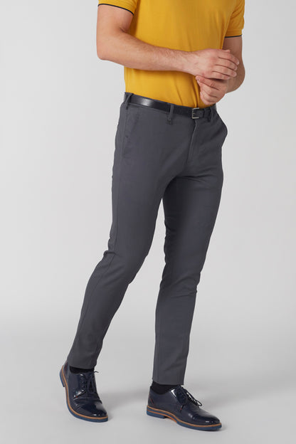 Grey men's trousers with belt loops and front button closure
