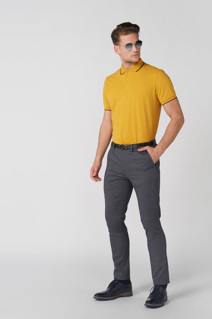 Grey men's trousers with belt loops and cuffed hems