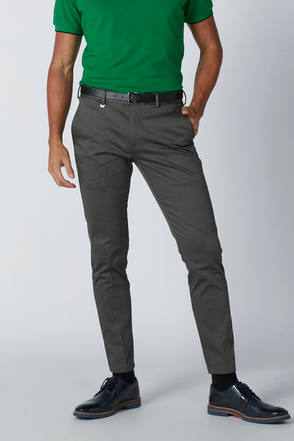 Men's green polo shirt and gray trousers with crease and belt loops