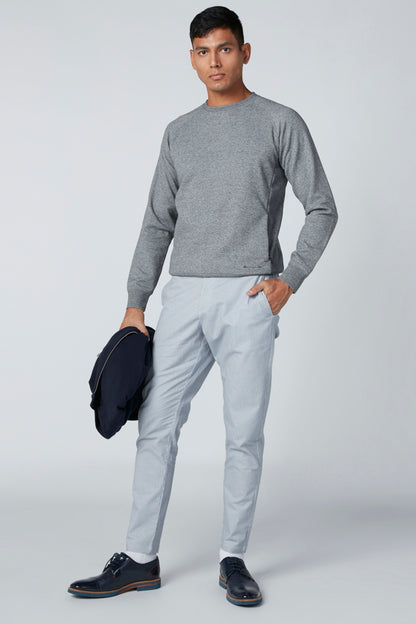 Men's heather gray crewneck long-sleeve shirt with light blue slim pants