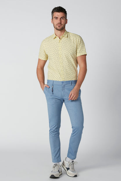 Light blue jeans, slim straight leg, belt loops and zip fly
