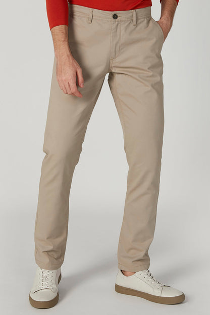 Casual tan pants front view with side pockets and stitched creases