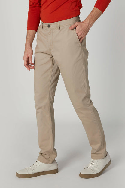 Casual tan pants with button fly, front pockets, belt loops