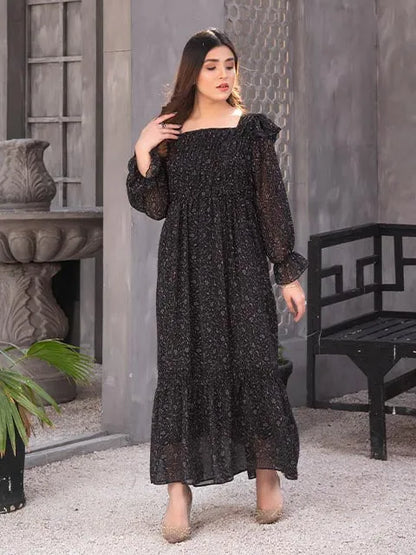 Nazmina black maxi dress with square neckline and full-length flared skirt