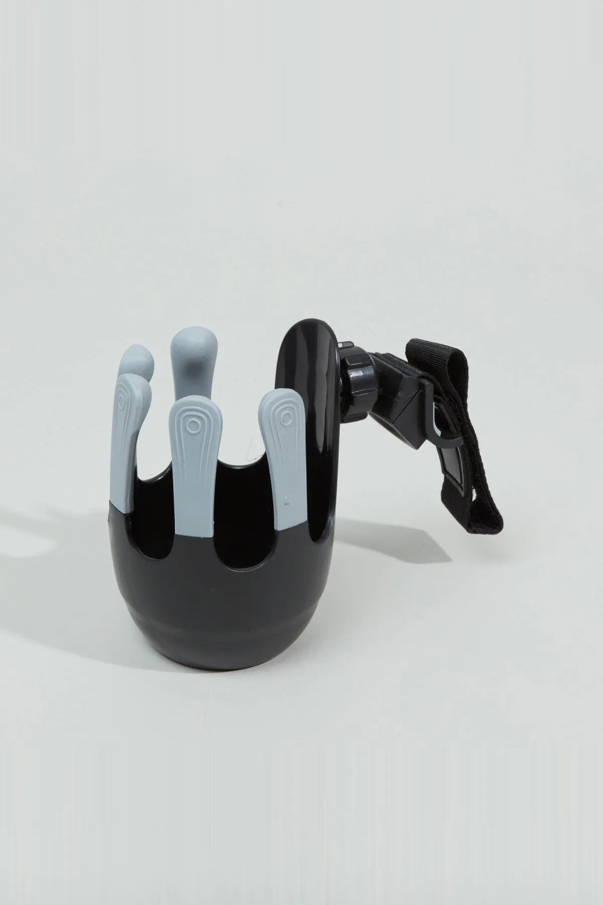 Black stroller cup holder with curved grip and rear strap clip