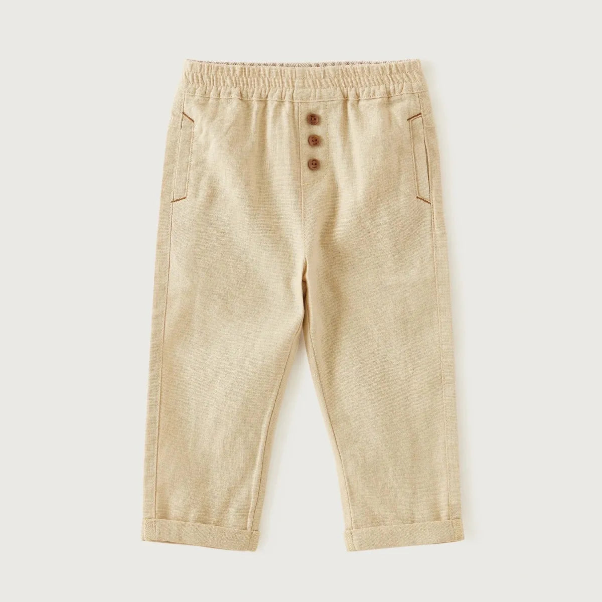 BabyShop beige baby trousers with elastic waistband, front button placket, side pockets
