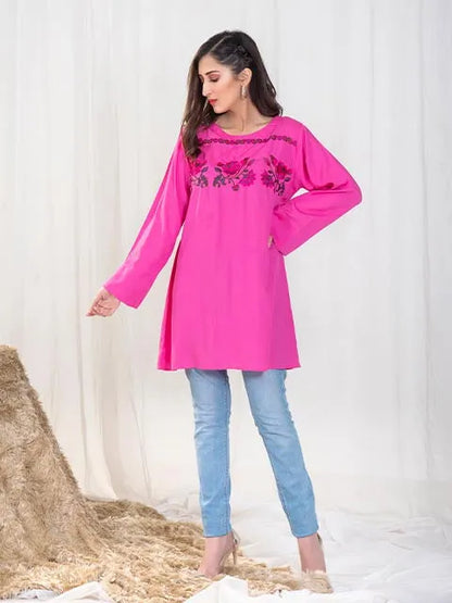 Pink long tunic with floral embroidery at the front, round neckline, long sleeves